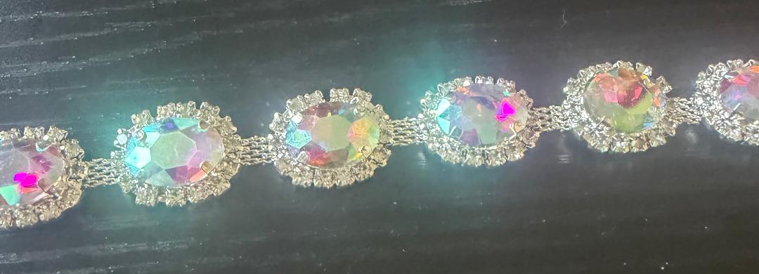 Oval A/B rhinestone trim with iridescent oval stones