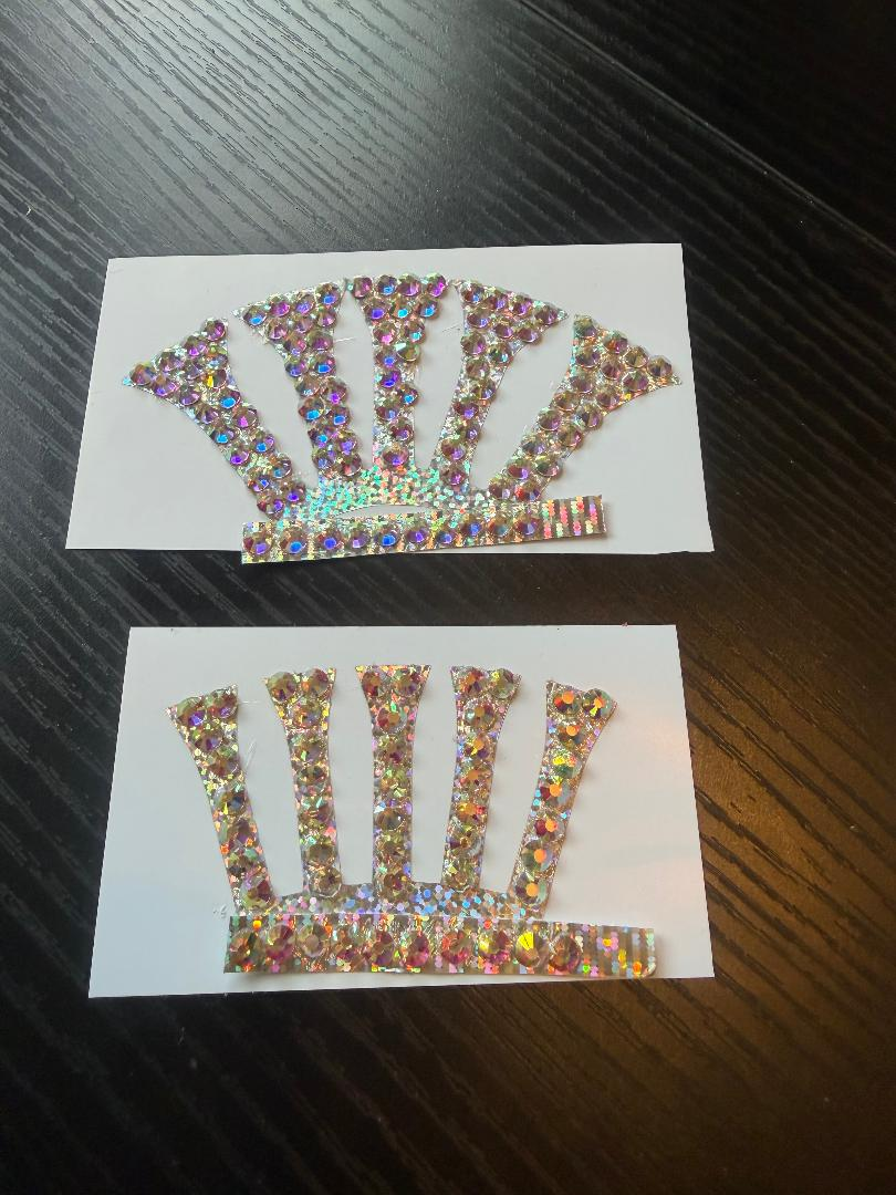 Two sparkling crown-shaped halo decoration designs